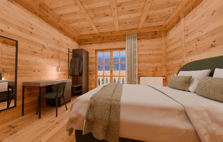 Schlafzimmer mit Holzwänden, großem Bett, Schreibtisch mit Stuhl und Fenster mit Blick auf Berge.