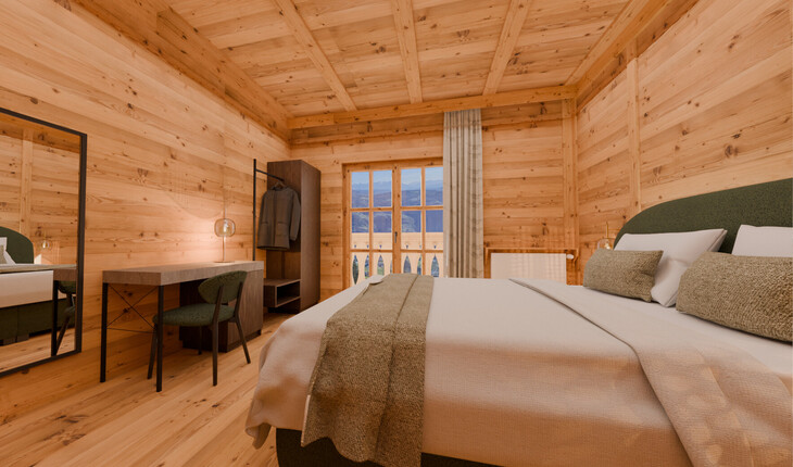 Schlafzimmer mit Holzwänden, großem Bett, Schreibtisch mit Stuhl und Fenster mit Blick auf Berge.
