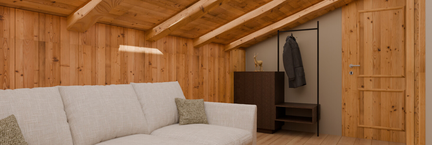 Gemütliches Zimmer mit schräger Holzdecke, Dachfenster, hellgrauem Sofa und Garderobe mit Jacke.
